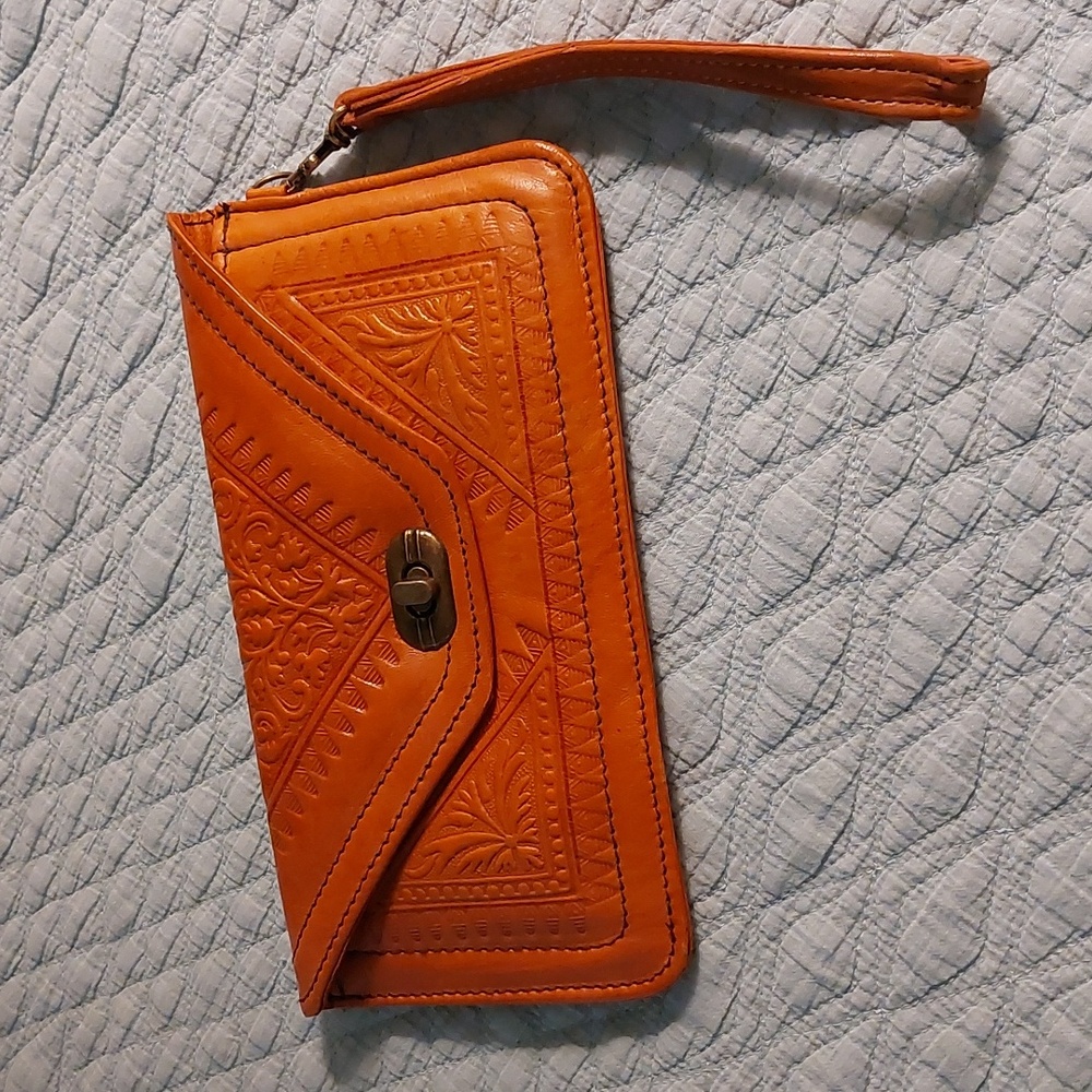 Tooled leather wristlet